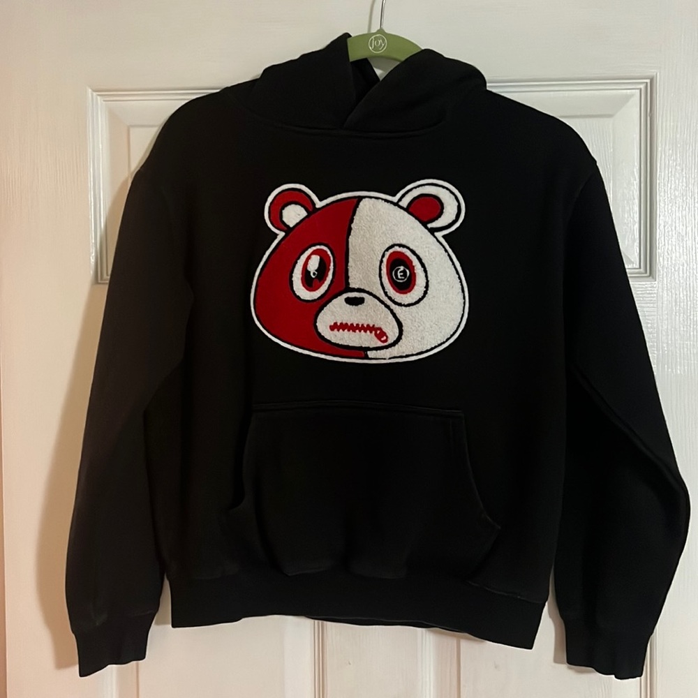 Black effectus brand hoodie. Size xl in kids.